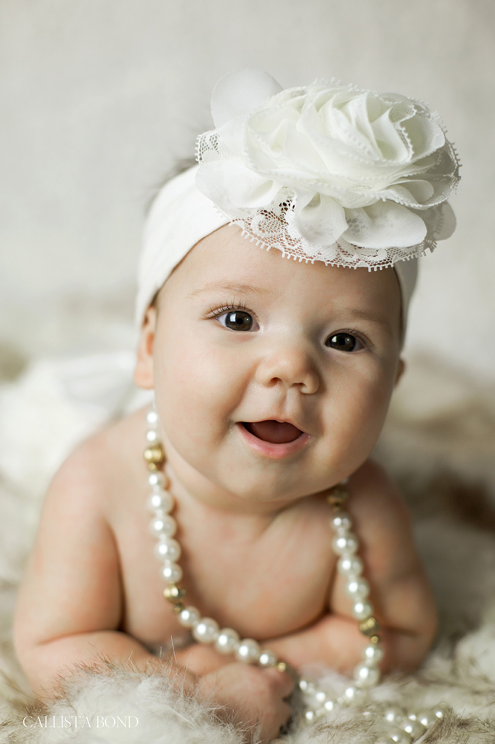 Callista Bond Photography, Family Photographer, Kansas City, Columbia, Missouri, Kansas, Blue Springs, Infant, Newborn, Baby, White, Studio, Ruffles, Flower, Portraits